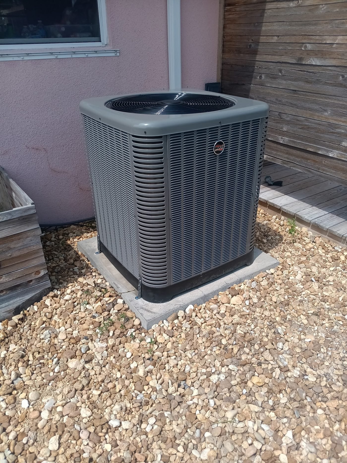 Outdoor AC condenser installation