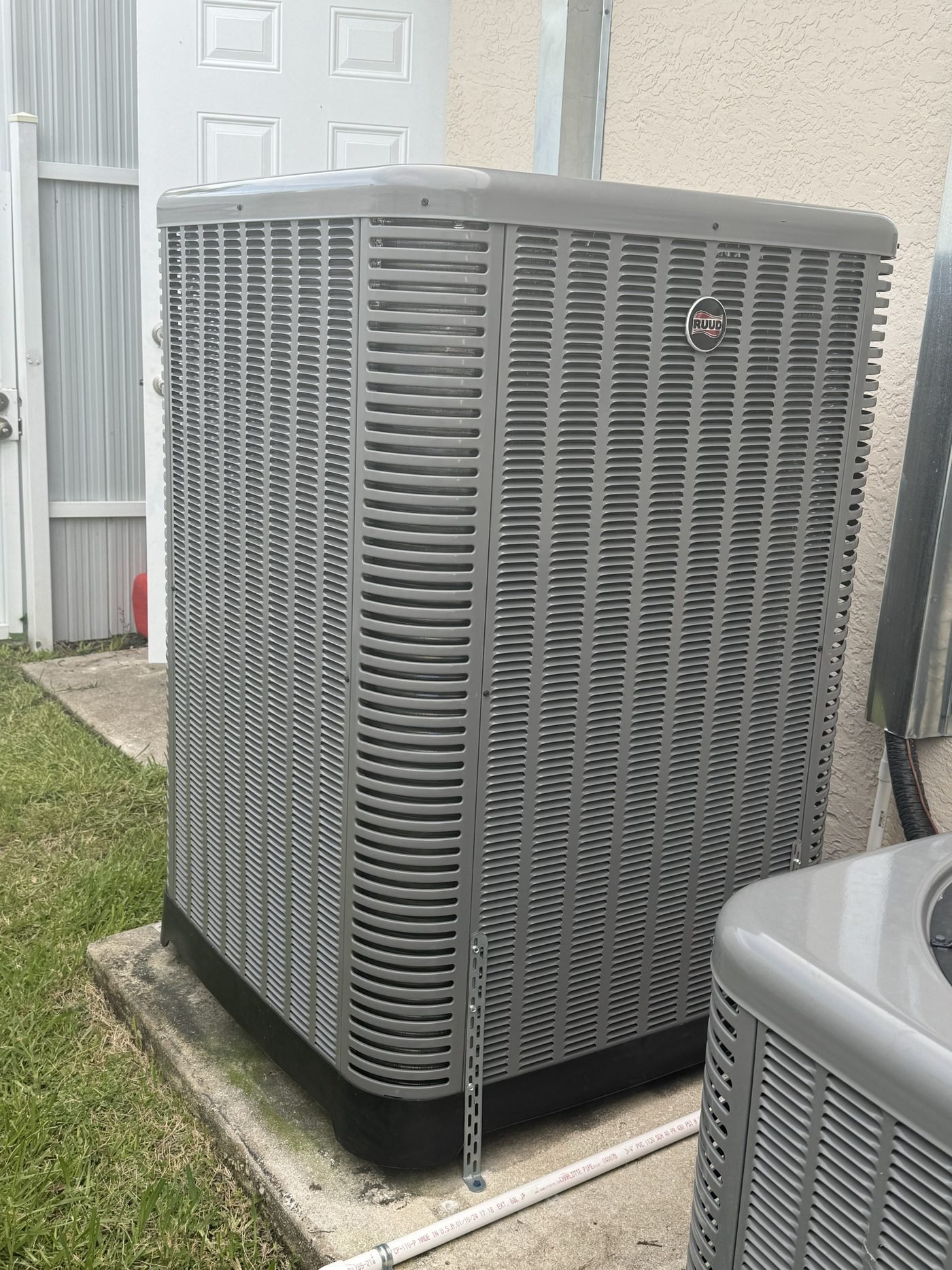 Ruud outdoor condenser unit new installation Florida